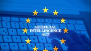 Robot hand using a computer with the European Flag as background, concept of artificial Intelligence Act.